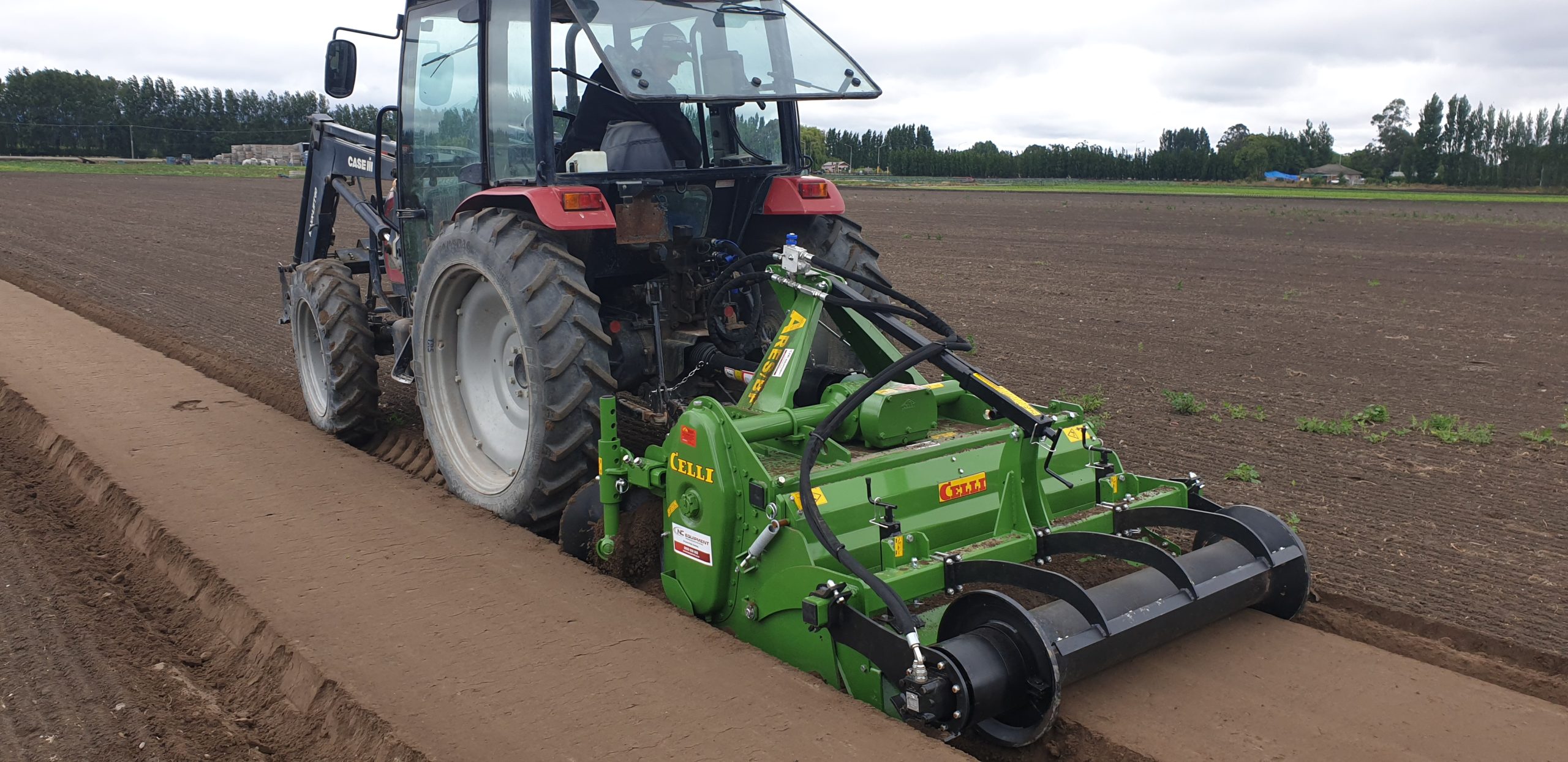 Celli bed former rotary hoe for vegetable bed forming with hydraulic motorised rear roller. Available from NC Equipment
